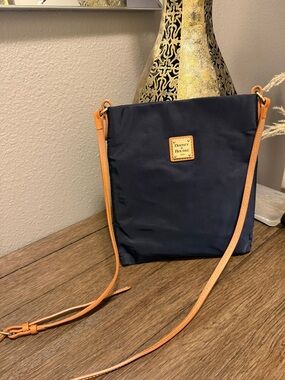 Dooney & Bourke Navy Crossbody with Tan Strap and Logo Plaque